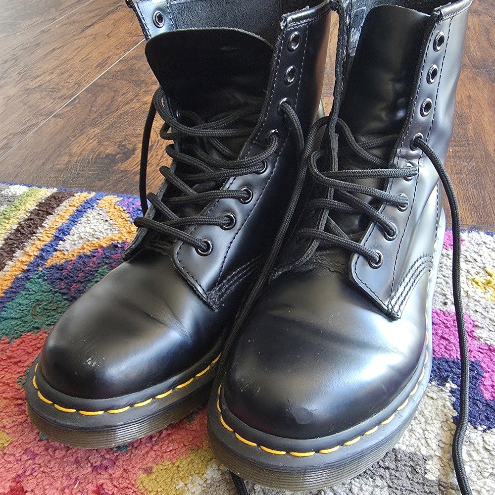 Dr. Martens Black Leather Boots with Yellow Accents